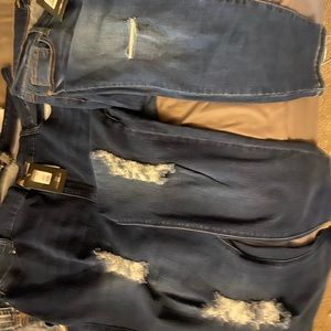 Fashion Nova distressed, booty sculpting jeans.